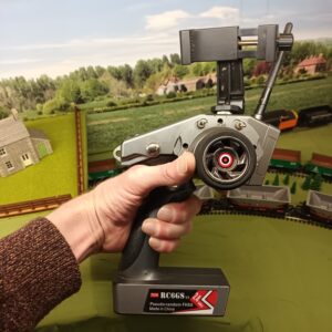 Me holding a Radiolink RC6GS V3 showing it can be controlled one handed