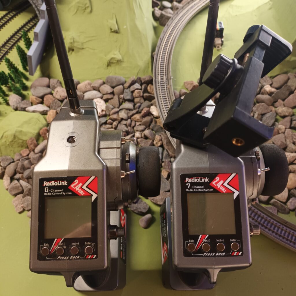 Side by side stood up view of Radiolink RC6GS V3 and Radiolink RC6GS V2